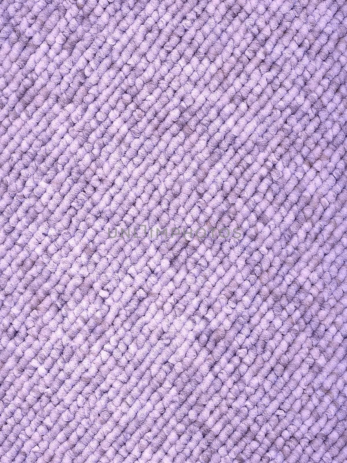 Sample piece of a Loop-woven carpet in a modern light lilac color tone. A useful picture for architects and people doing home decorations or a nice texture background for related subjects.