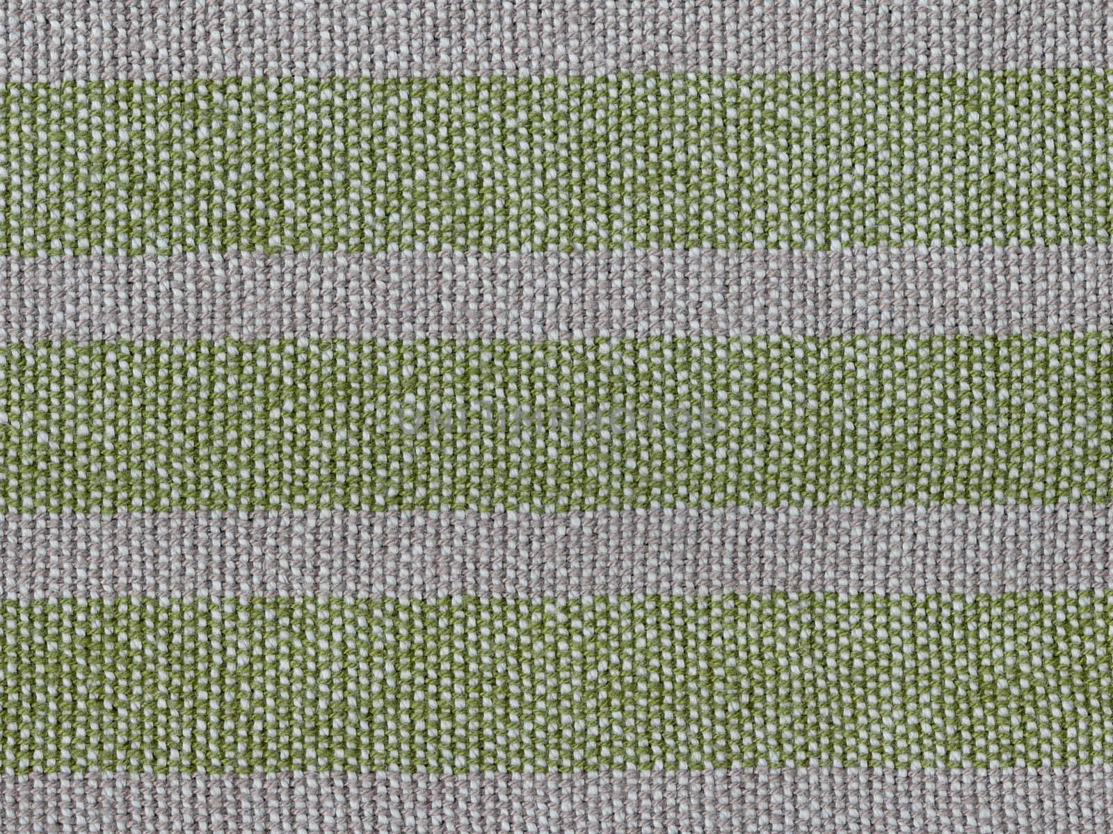 A close-up background of oldfashioned hand-woven flax linen with a rough structure and trendy green and grey stripes.