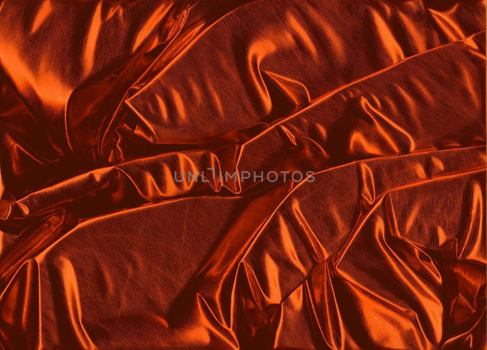 An exclusive background of shiny copper decoration fabric with a metallic surface.