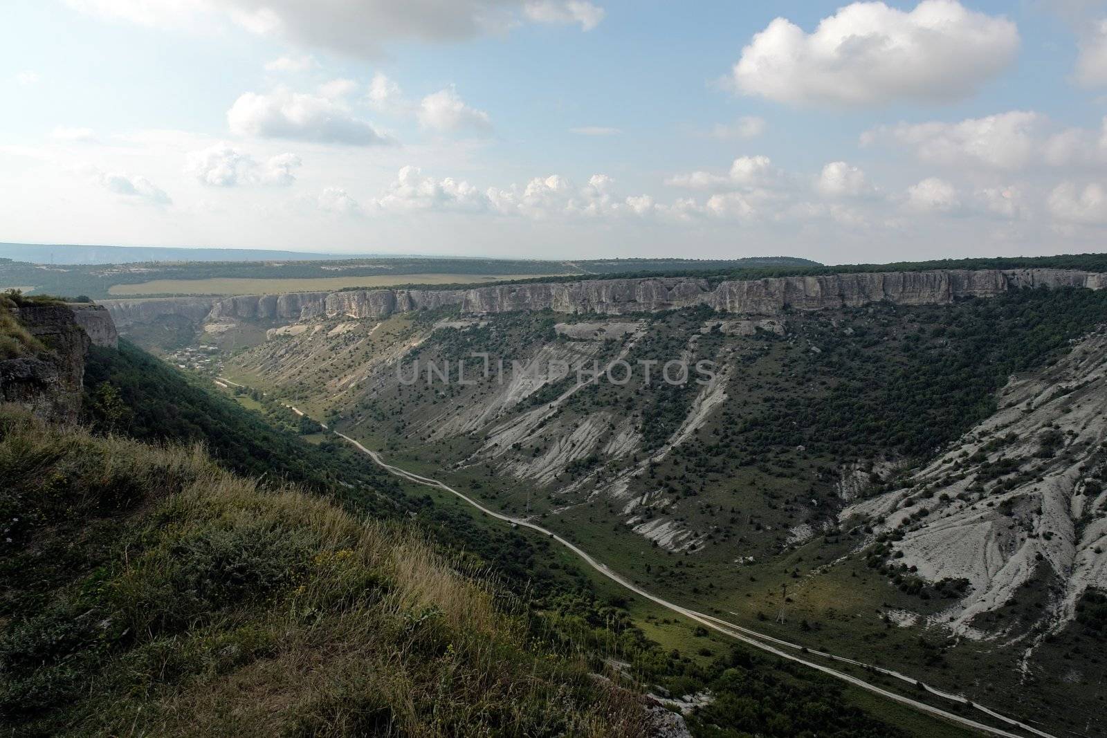 Clouds above the road in the mountain gorge.