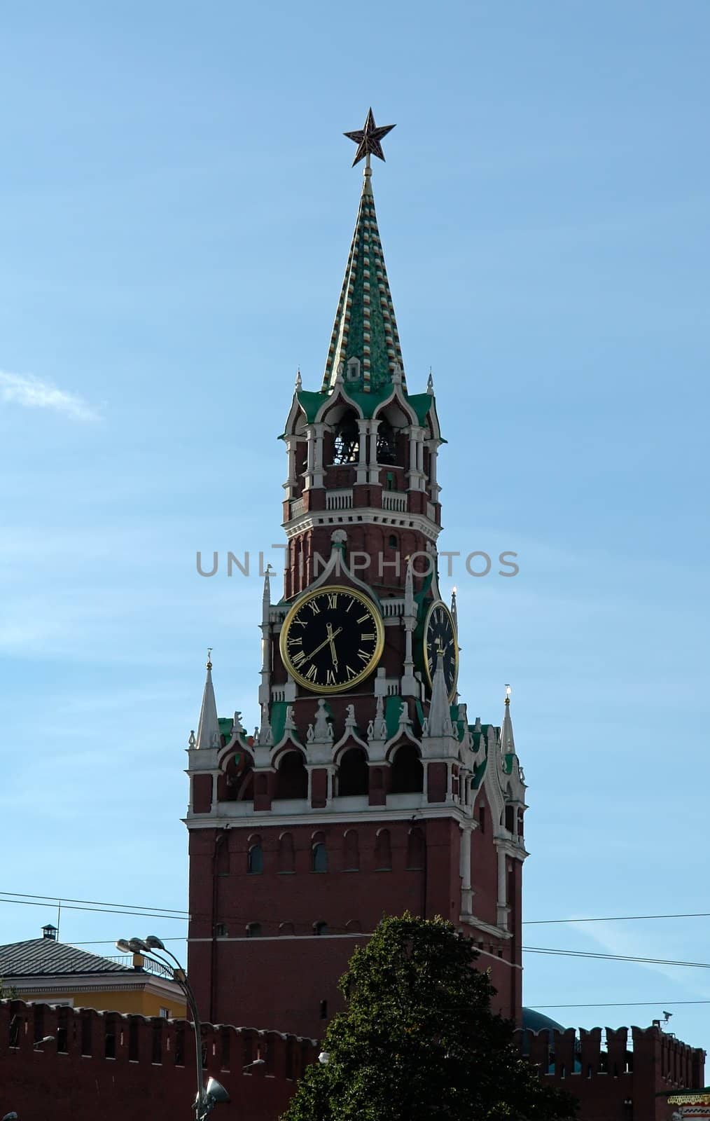 tower of the Kremlin with a clock on the Red Square in Moscow