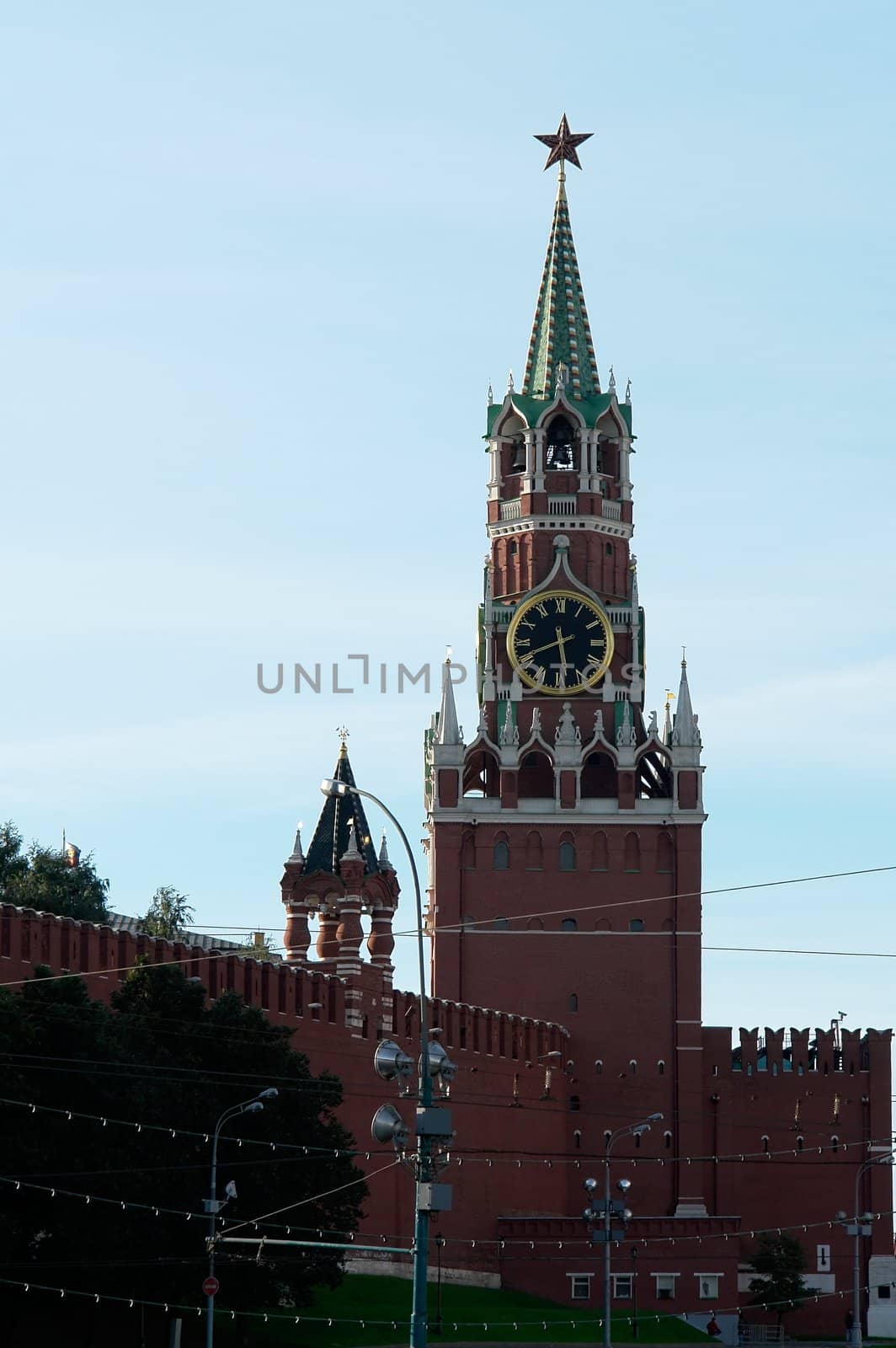 tower of the Kremlin with a clock on the Red Square in Moscow