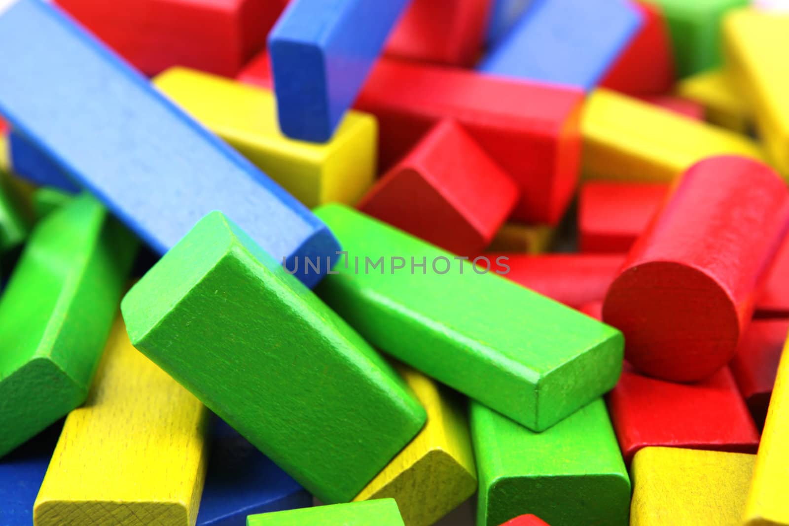 Wooden building blocks isolated on white background