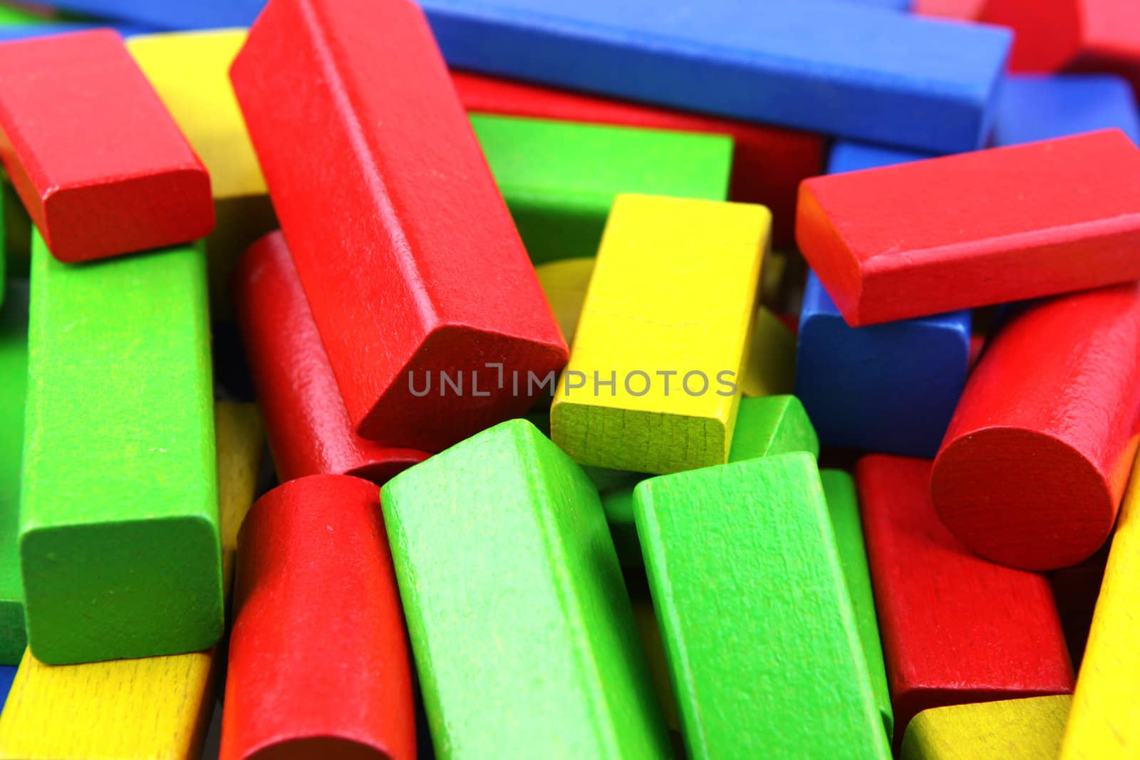 Wooden building blocks isolated on white background