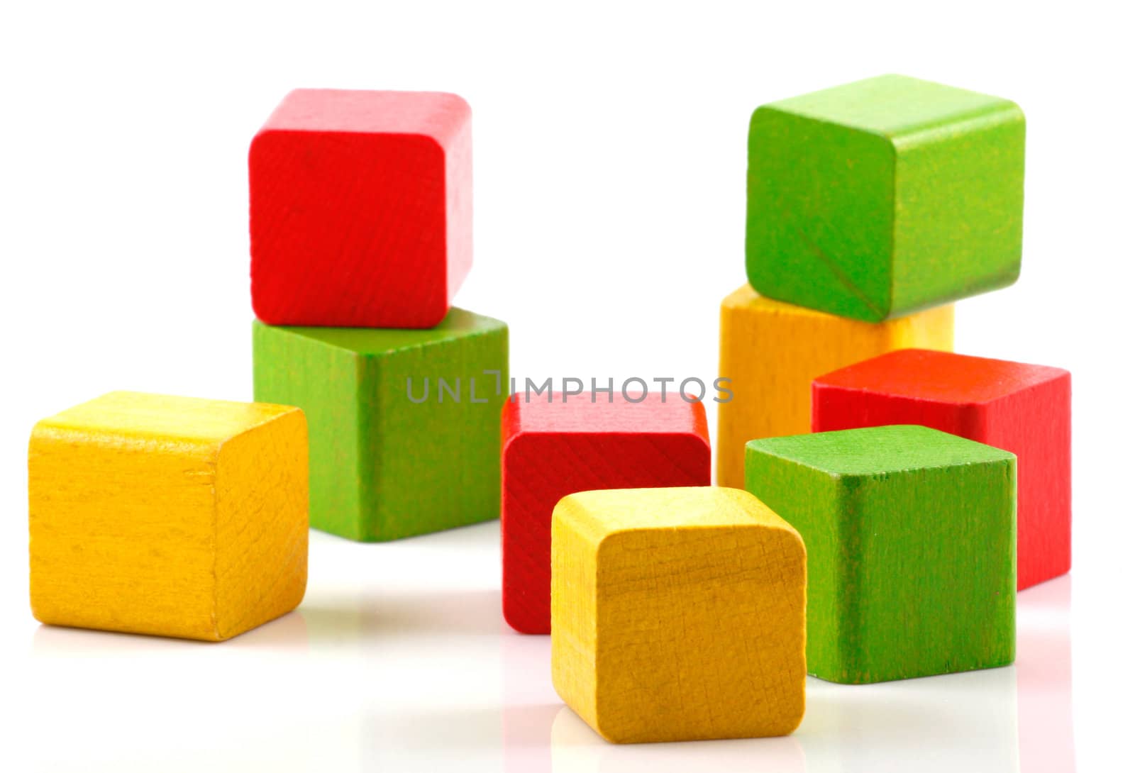 Wooden building blocks isolated on white background