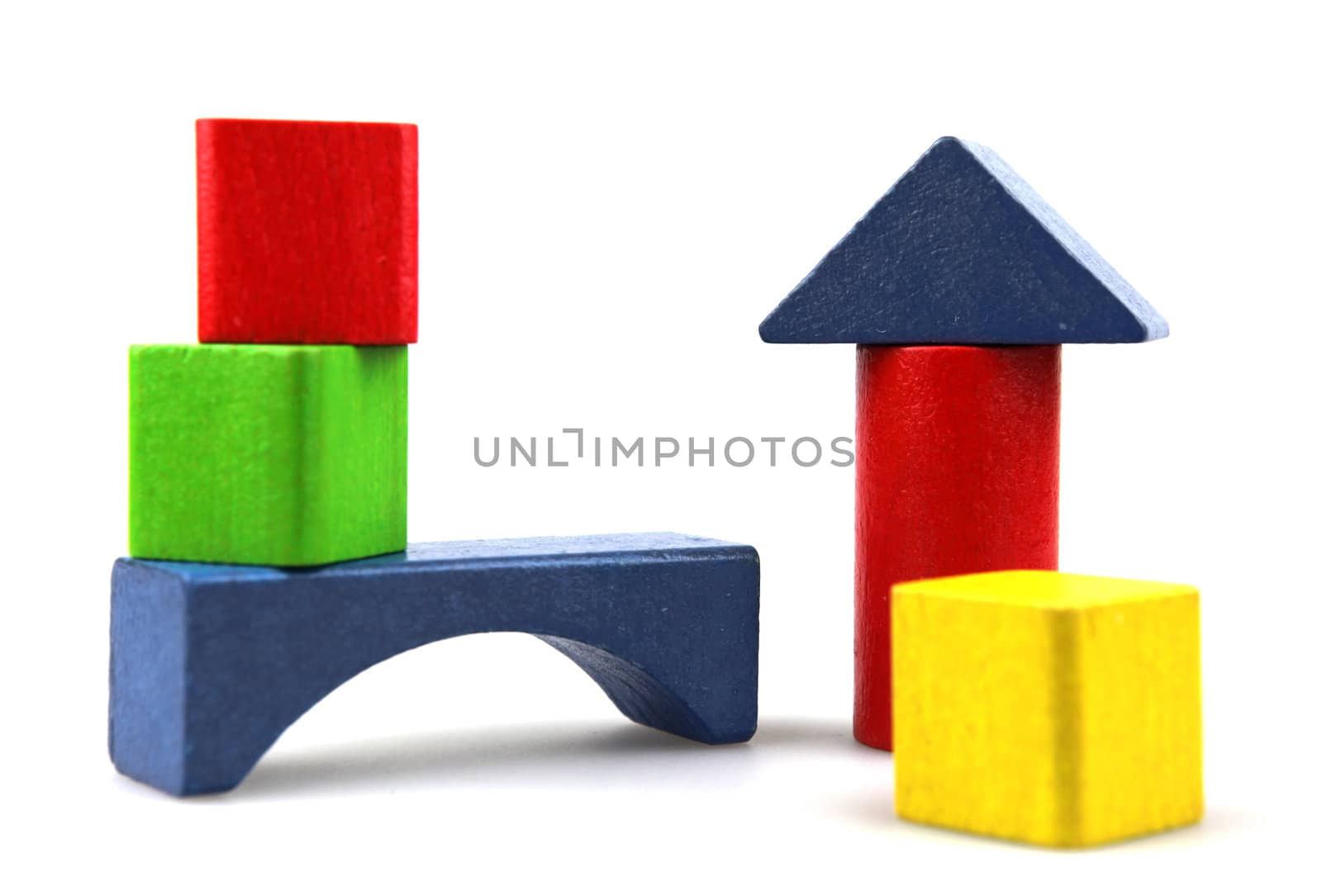 Wooden building blocks isolated on white background