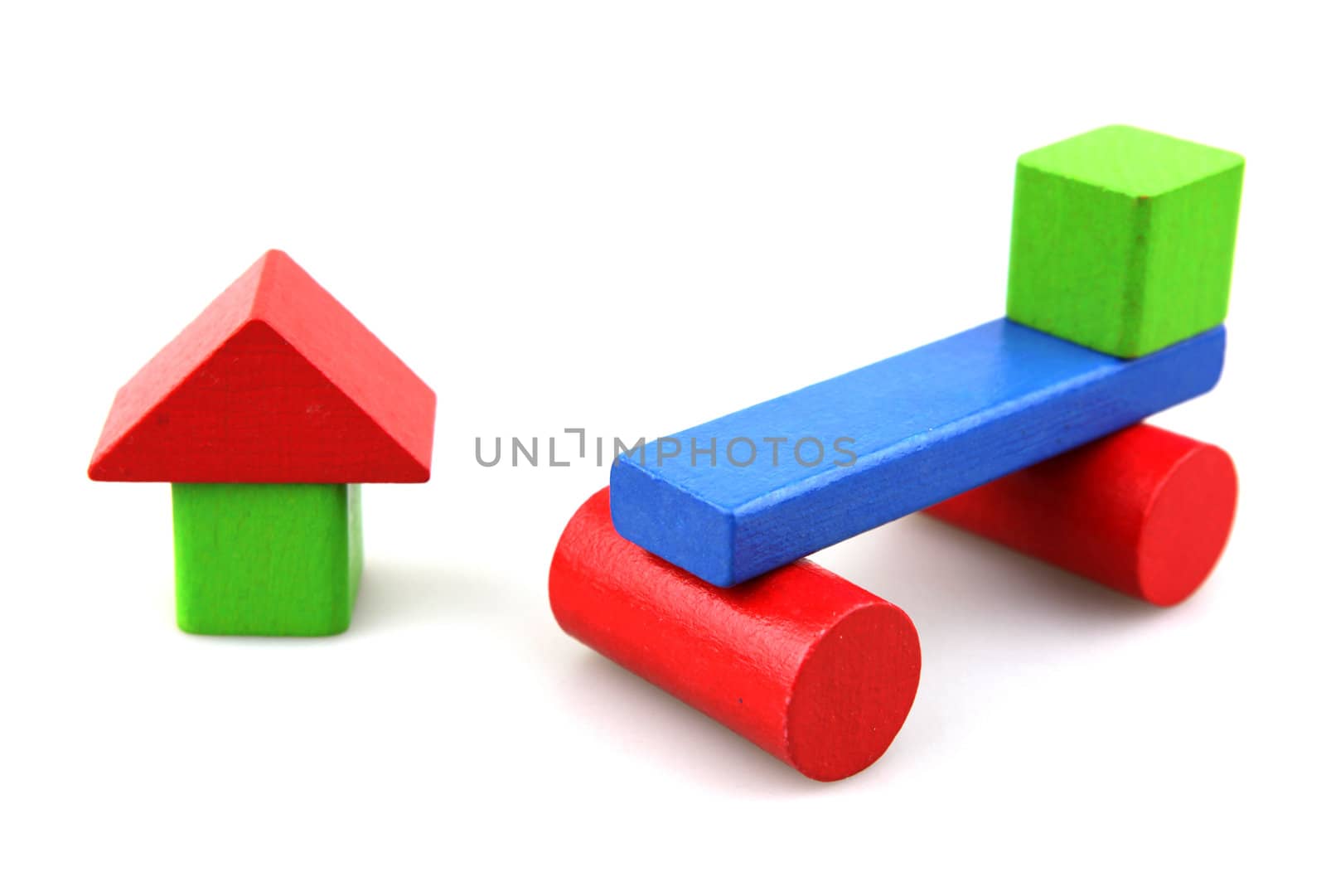 Wooden building blocks isolated on white background