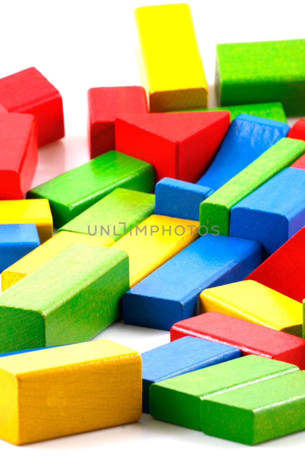 Wooden building blocks isolated on white background