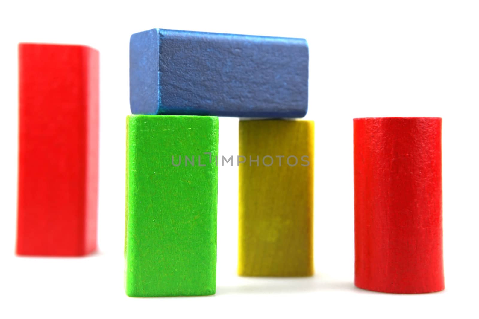 Wooden building blocks isolated on white background