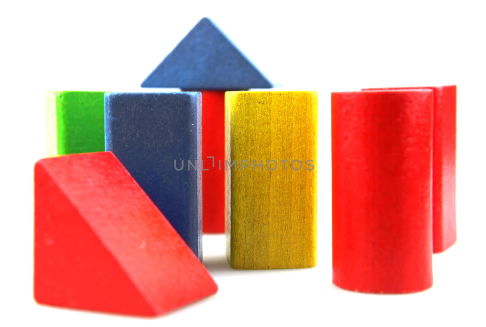 Wooden building blocks isolated on white background