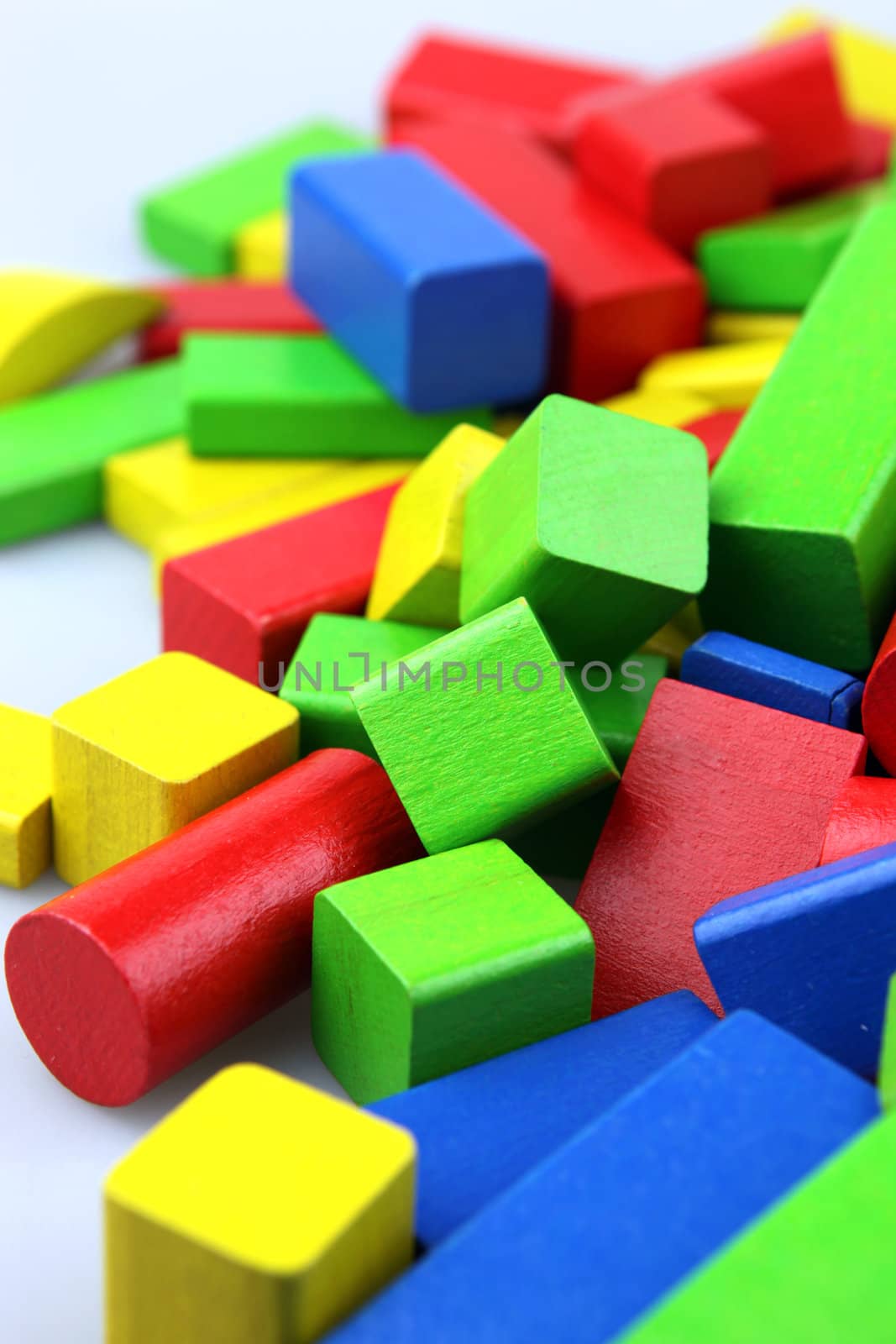 Wooden building blocks isolated on white background