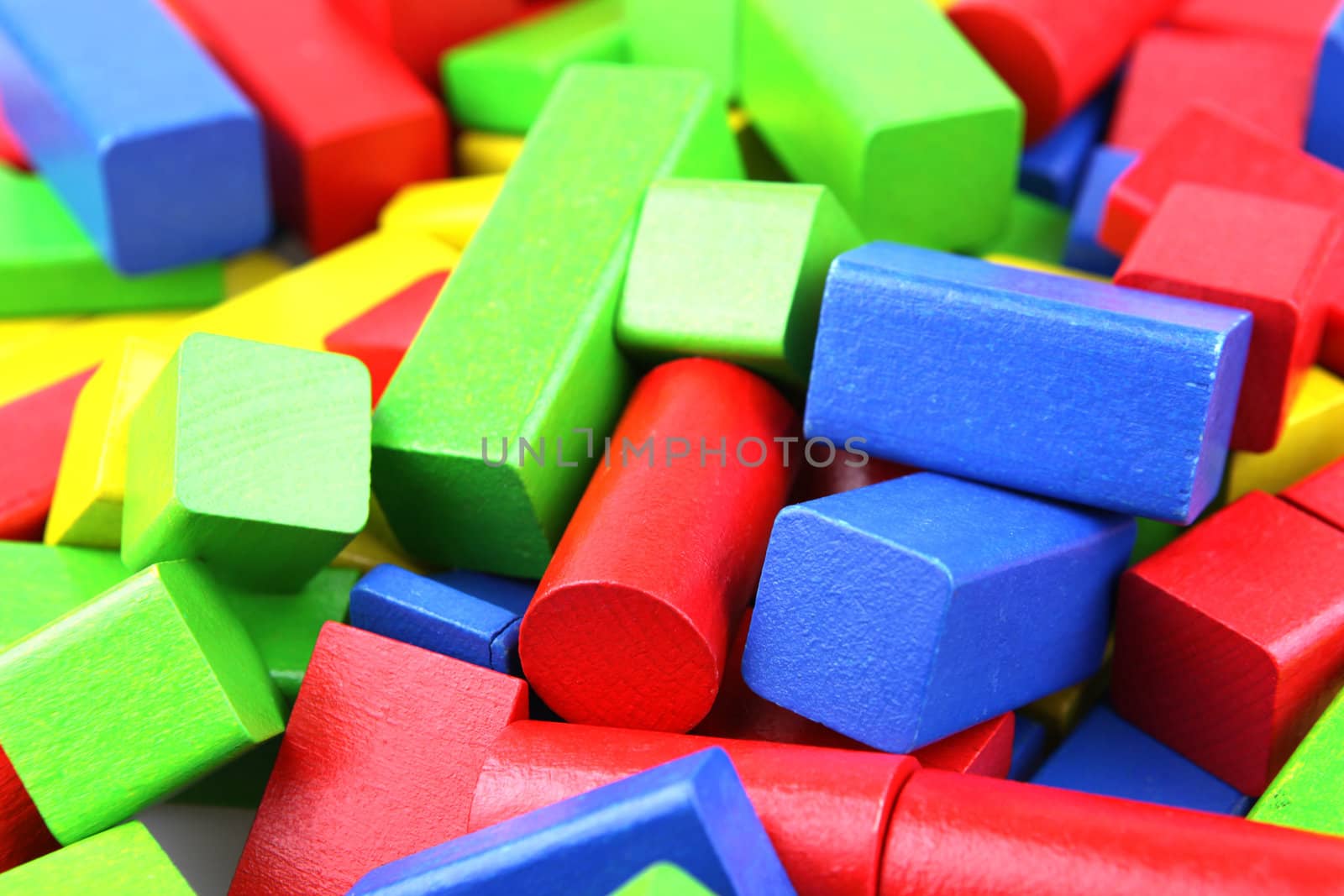 Wooden building blocks isolated on white background