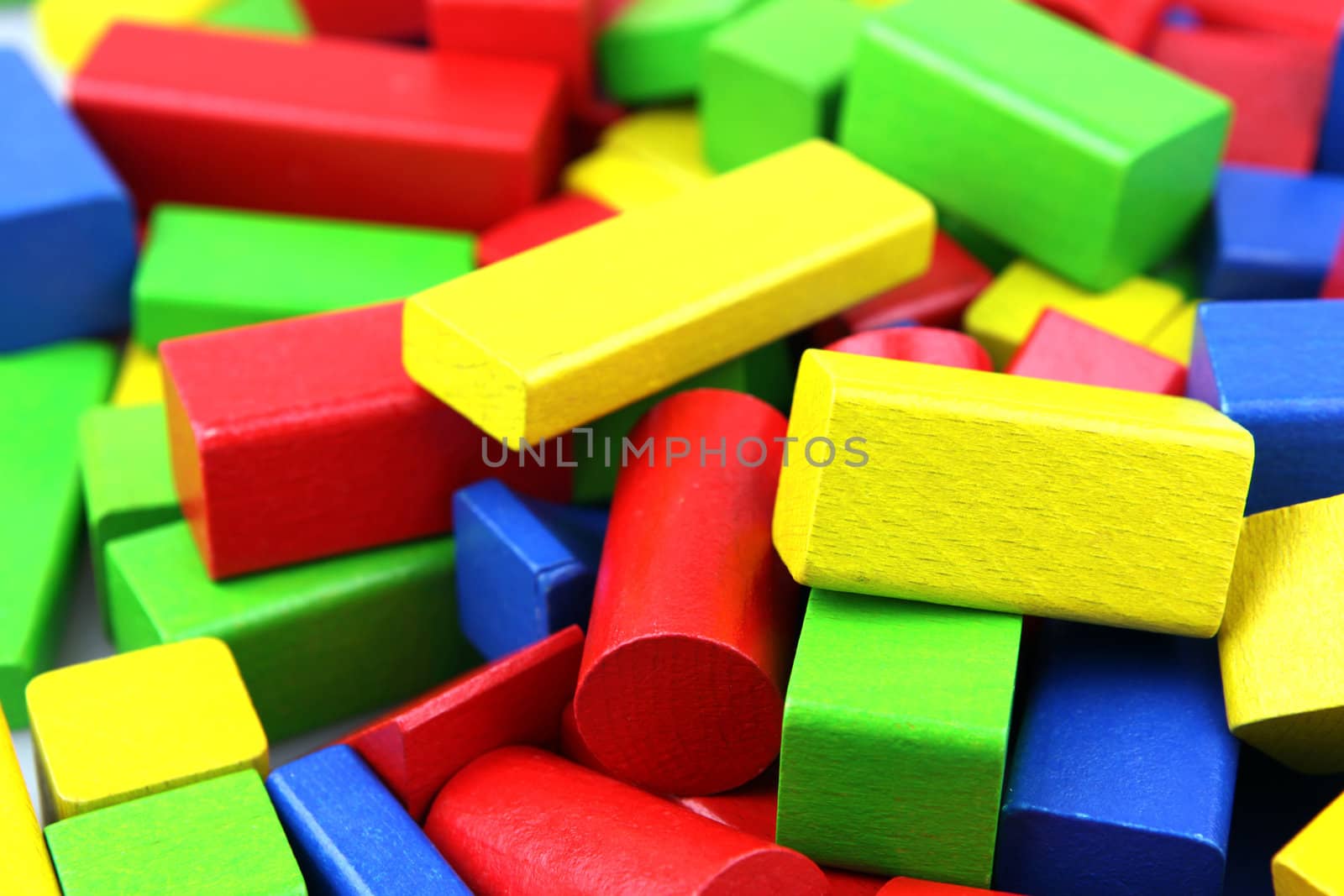 Wooden building blocks isolated on white background