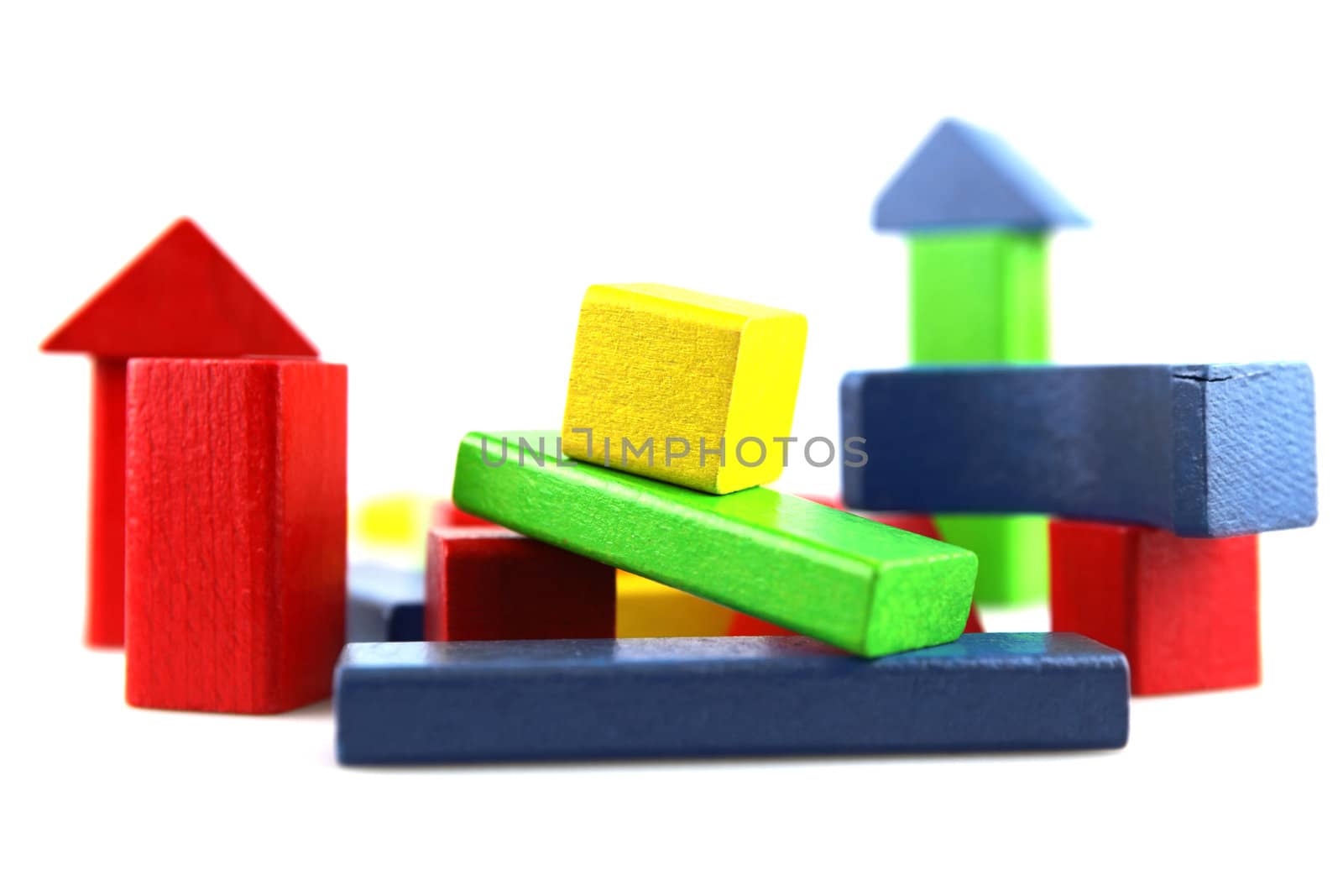 Wooden building blocks isolated on white background