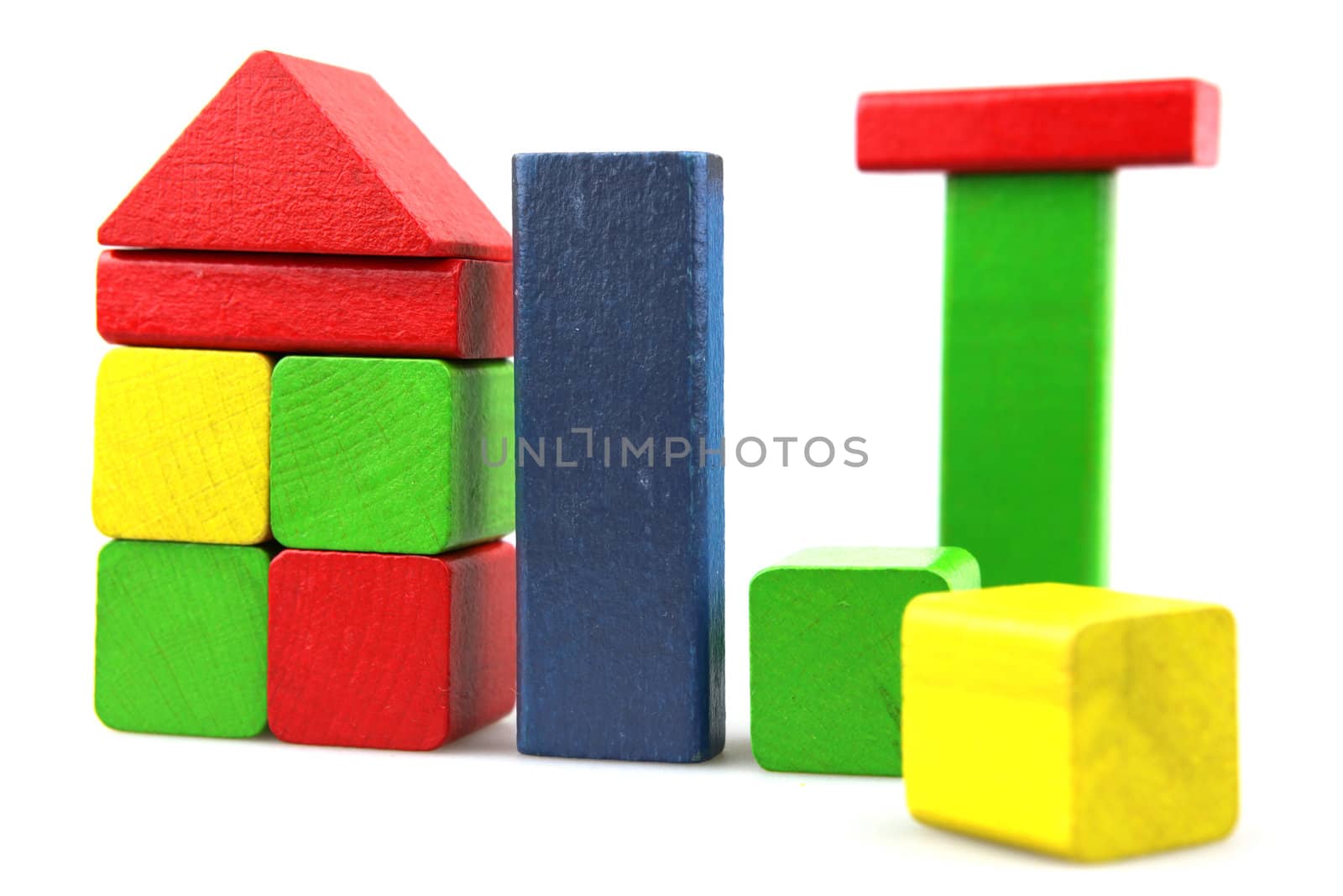 Wooden building blocks isolated on white background