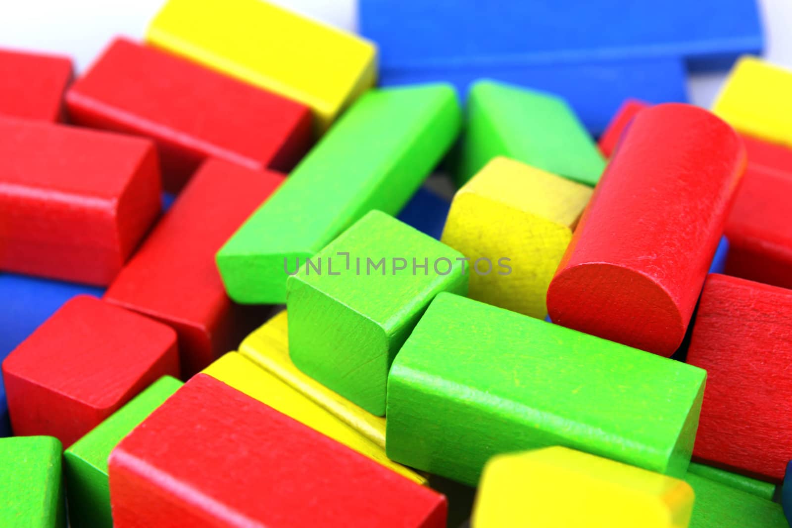 Wooden building blocks isolated on white background