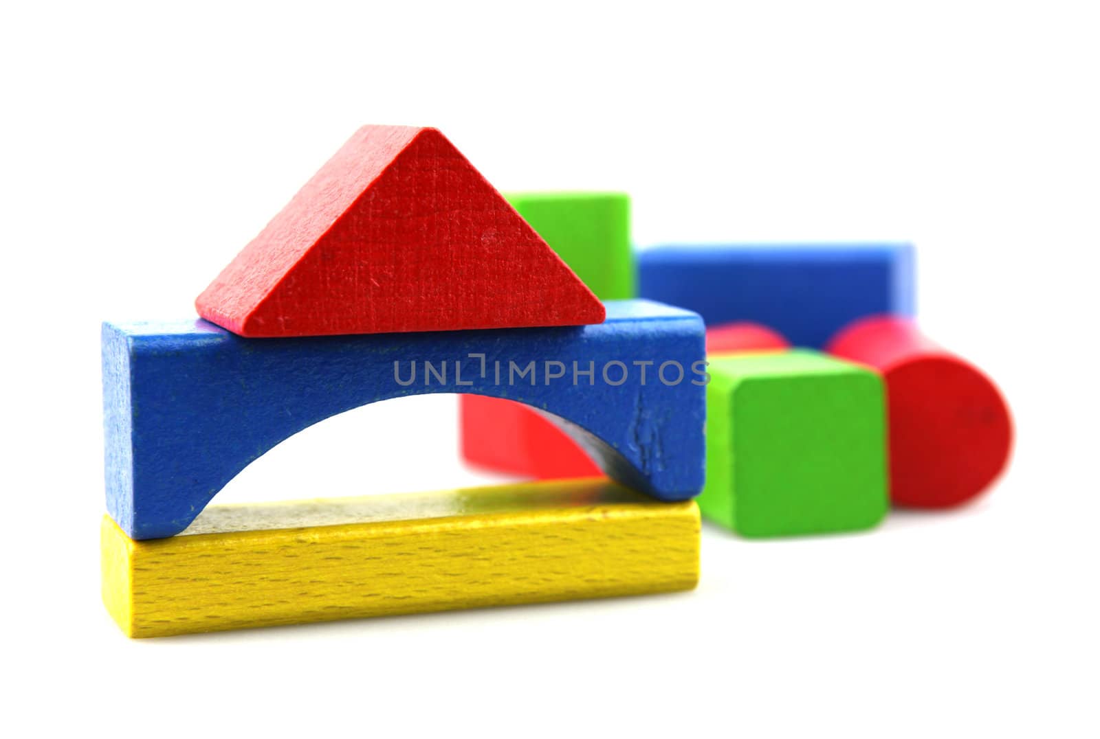 Wooden building blocks isolated on white background