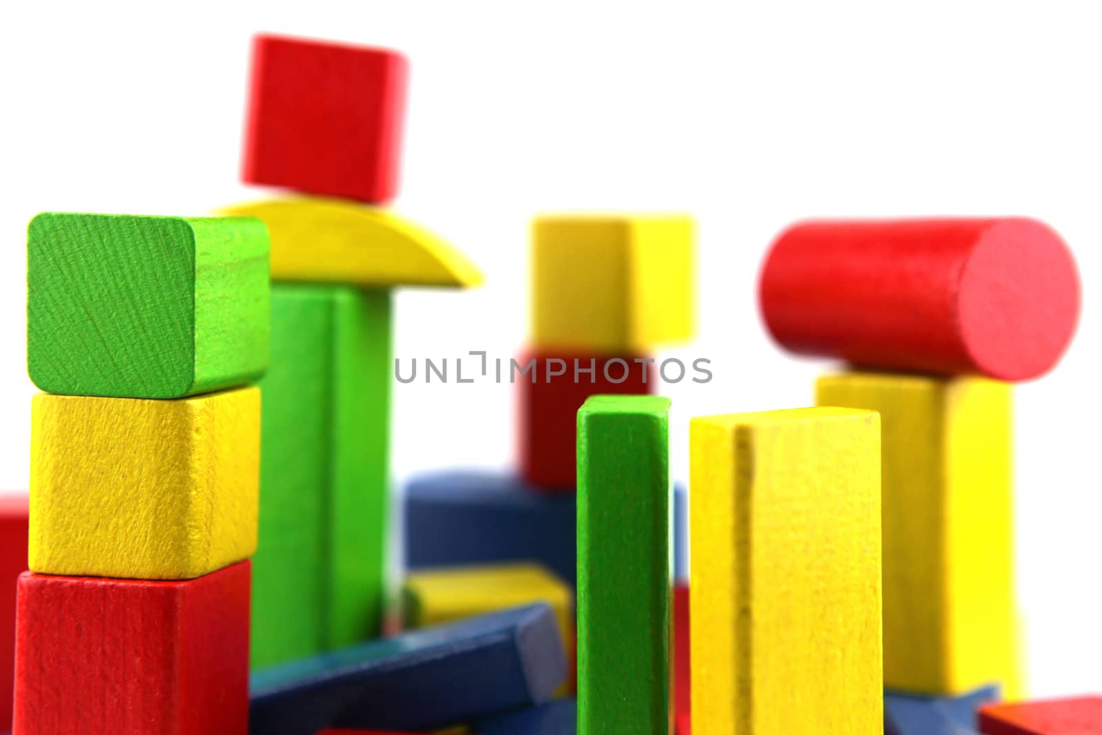 Wooden building blocks isolated on white background