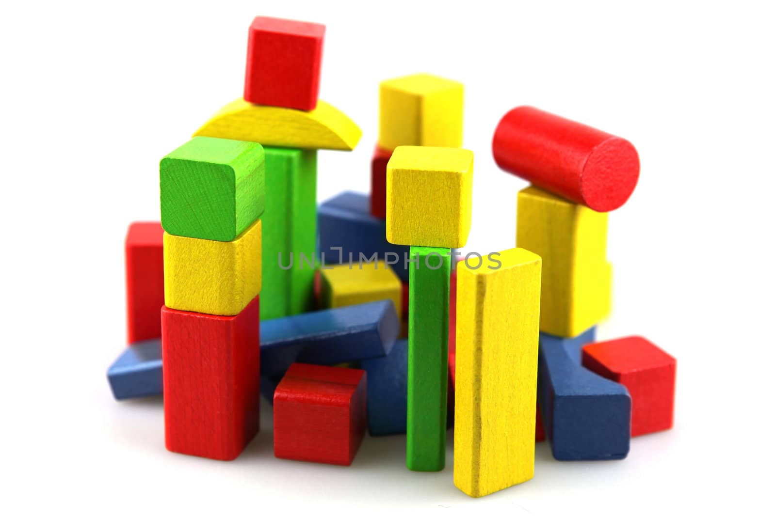 Wooden building blocks isolated on white background