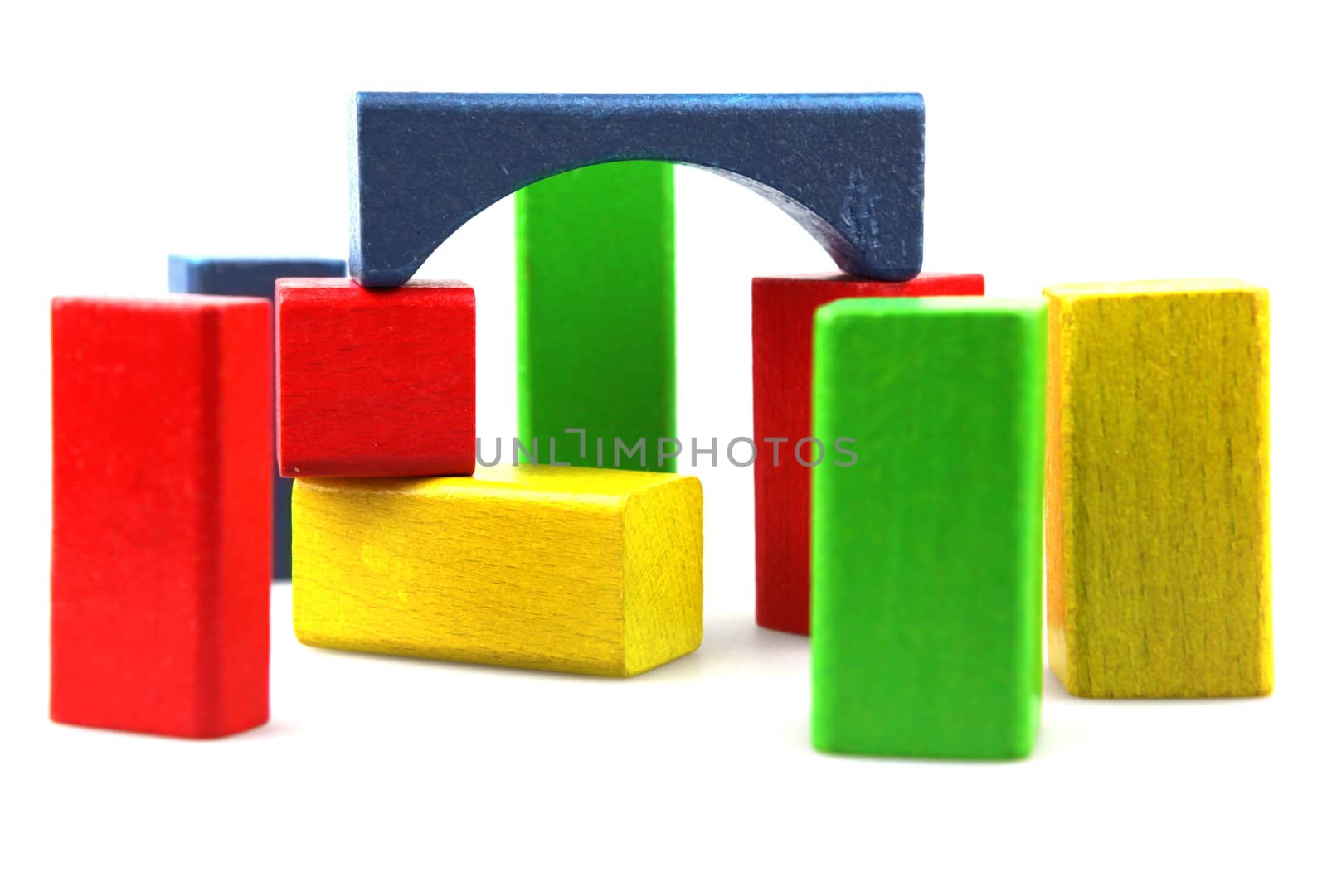 Wooden building blocks isolated on white background