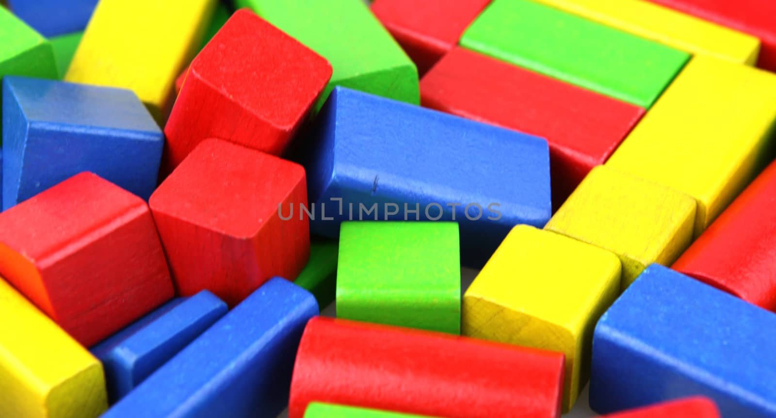 Wooden building blocks isolated on white background