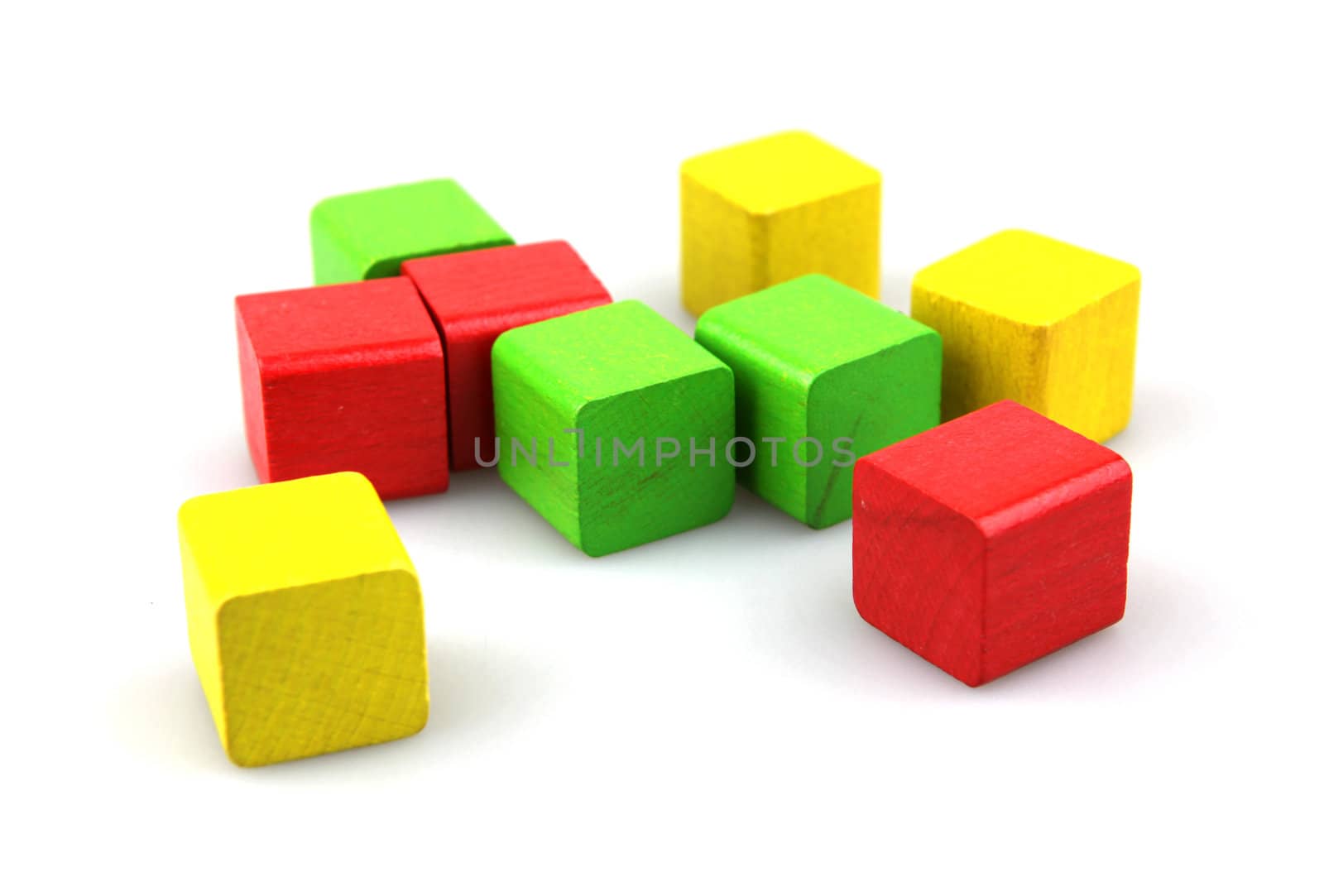 Wooden building blocks isolated on white background