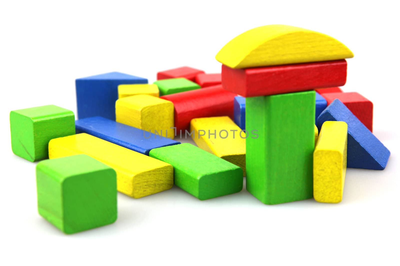 Wooden building blocks isolated on white background