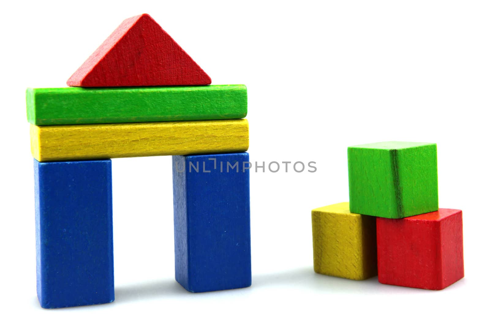 Wooden building blocks isolated on white background