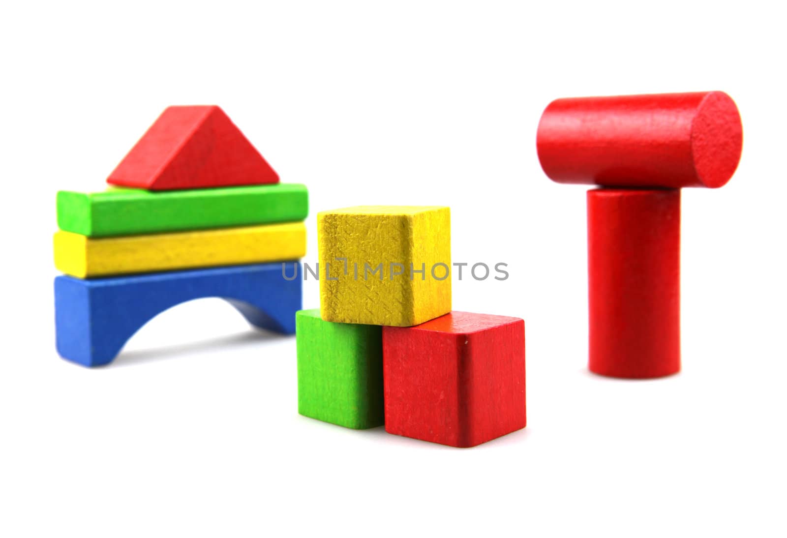 Wooden building blocks isolated on white background