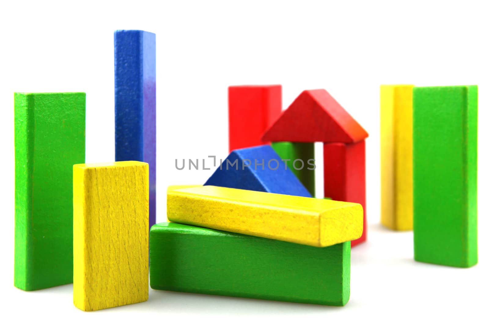 Wooden building blocks isolated on white background