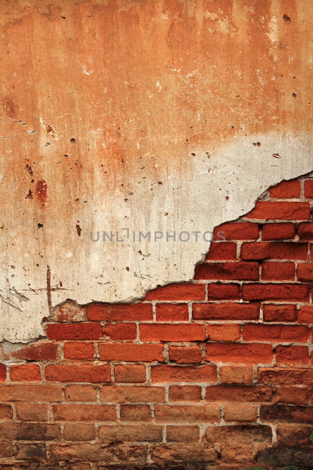 Background cracked concrete brick wall