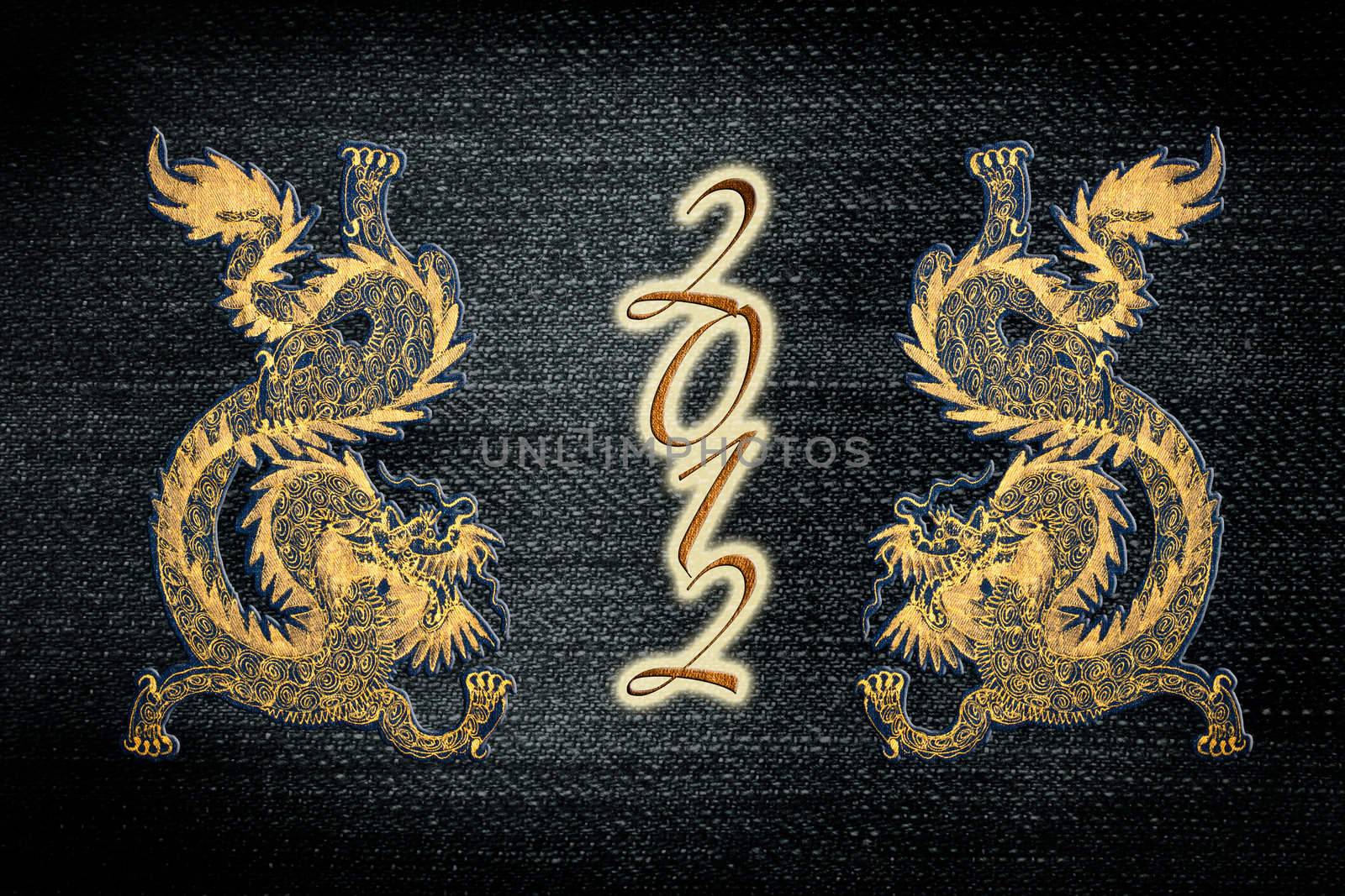 Golden paint chinese dragon on jean for 2012 year of the dragon  by Suriyaphoto