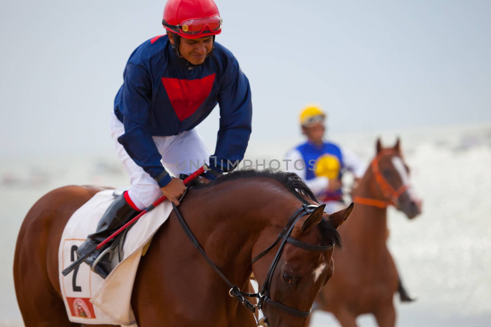 SANLUCAR DE BARRAMEDA, CADIZ, SPAIN - AUGUST 07: Unknown rider at the start of the horses races of the beach of Sanlucar de Barrameda on August 07, 2010 in Sanlucar de Barrameda, Cadiz, Spain.