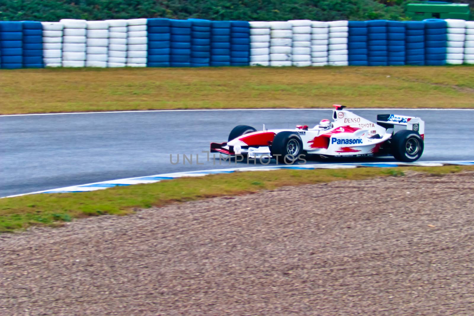 JEREZ DE LA FRONTERA, SPAIN - DEC 04: Jarno Trulli of Toyota F1 takes a curve during a training session on December 04, 2004, in Jerez de la Frontera, Spain