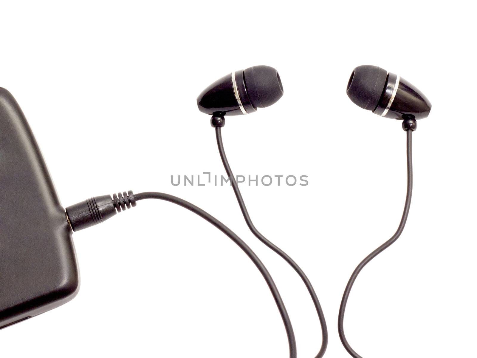 portable audio headphones attached to MP3 player
