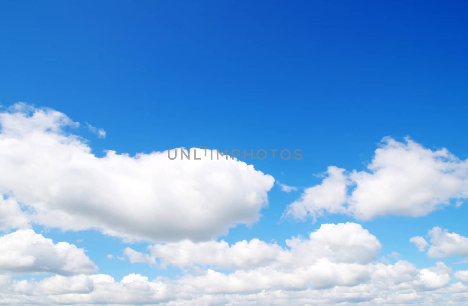 blue sky with clouds and sun