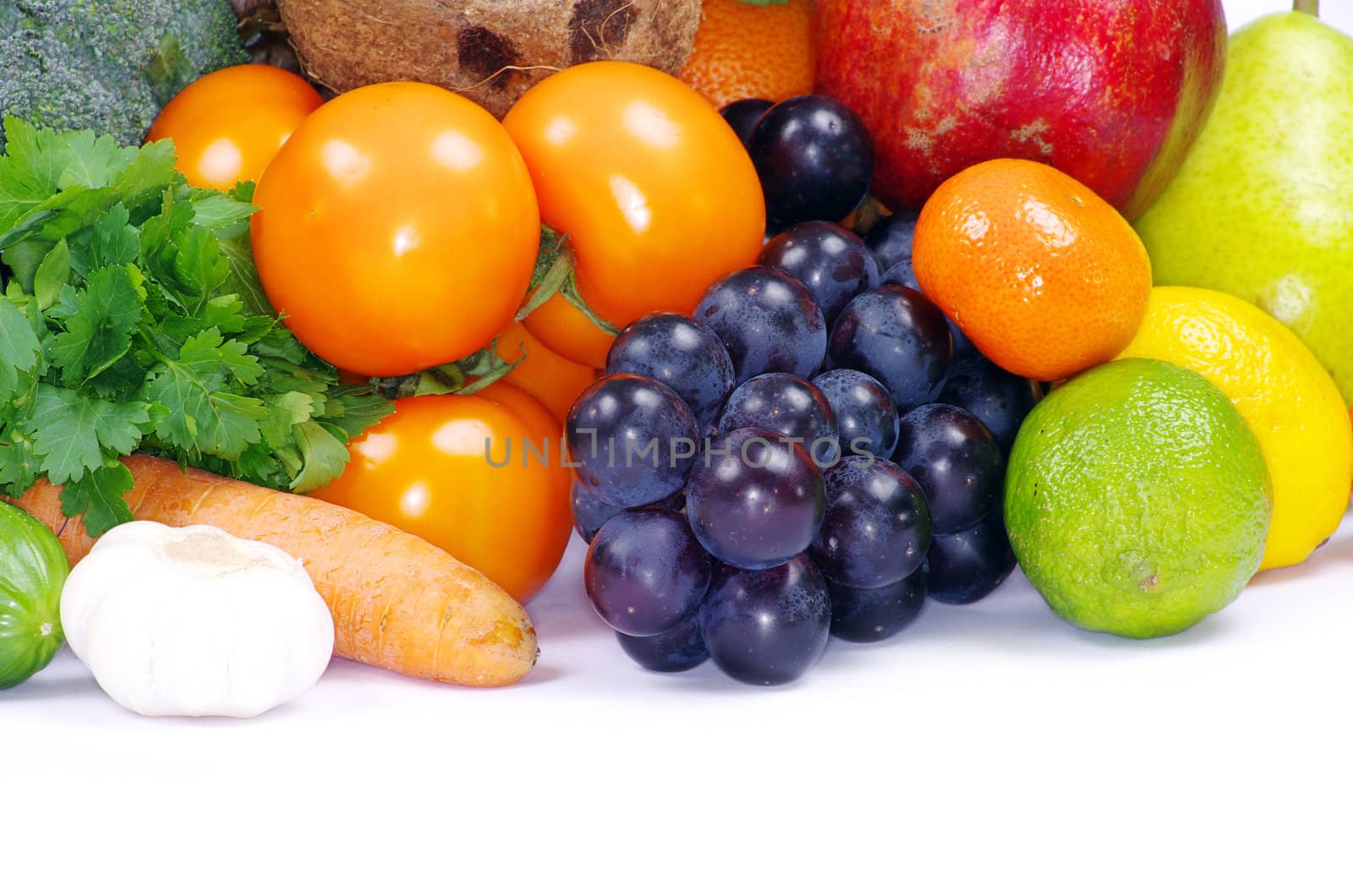 Fresh fruits and vegetables isolated on white