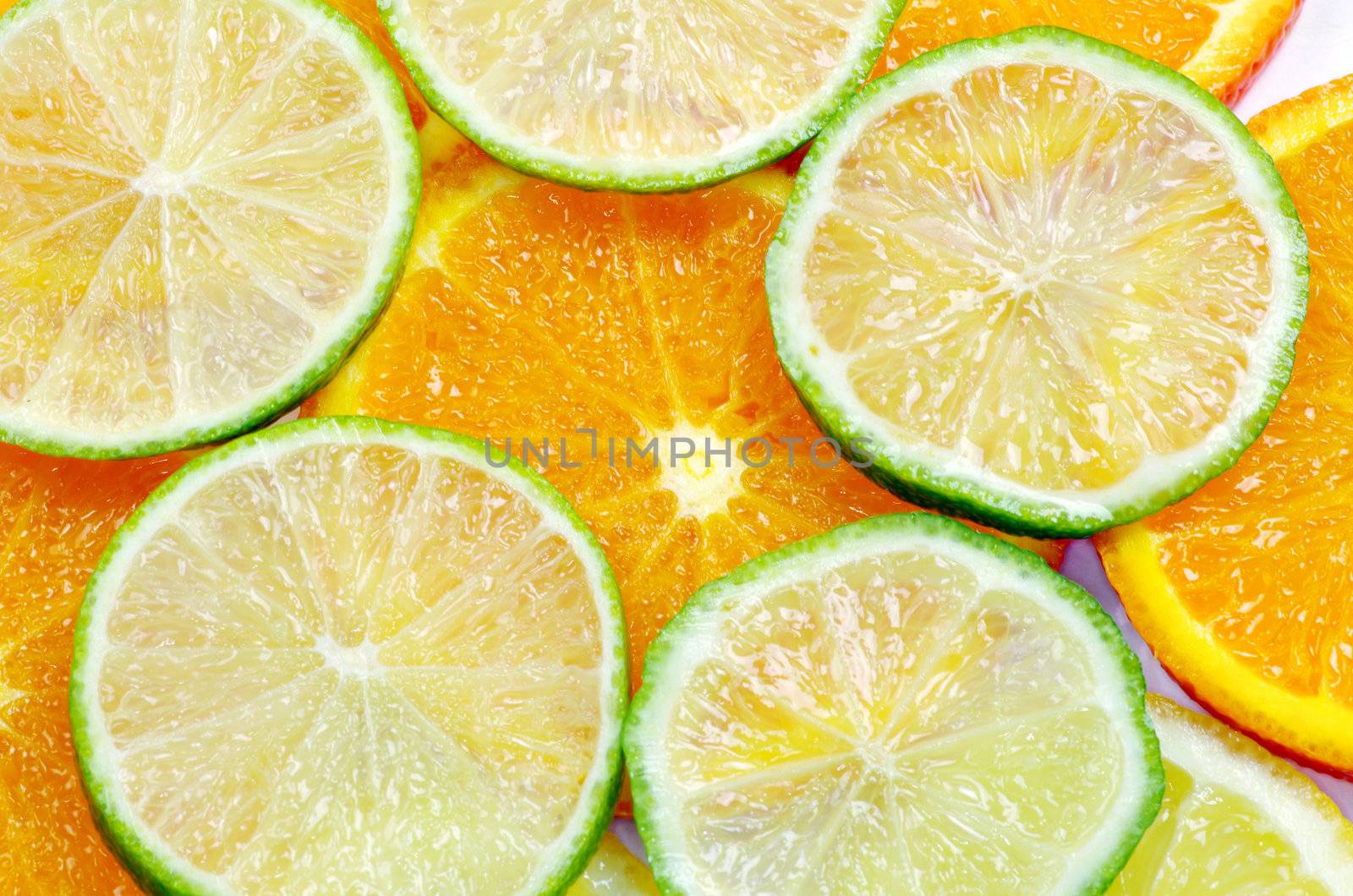 Mixed sliced citrus fruit background