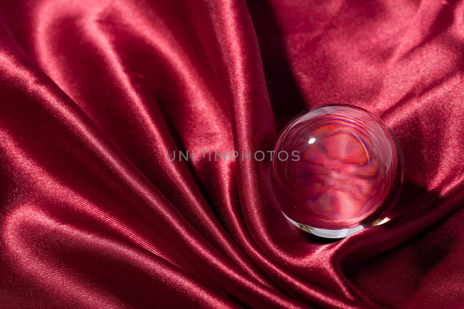 Red silk textile background by Suriyaphoto