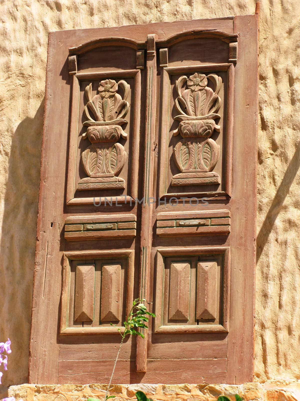 Old wooden door by vintrom