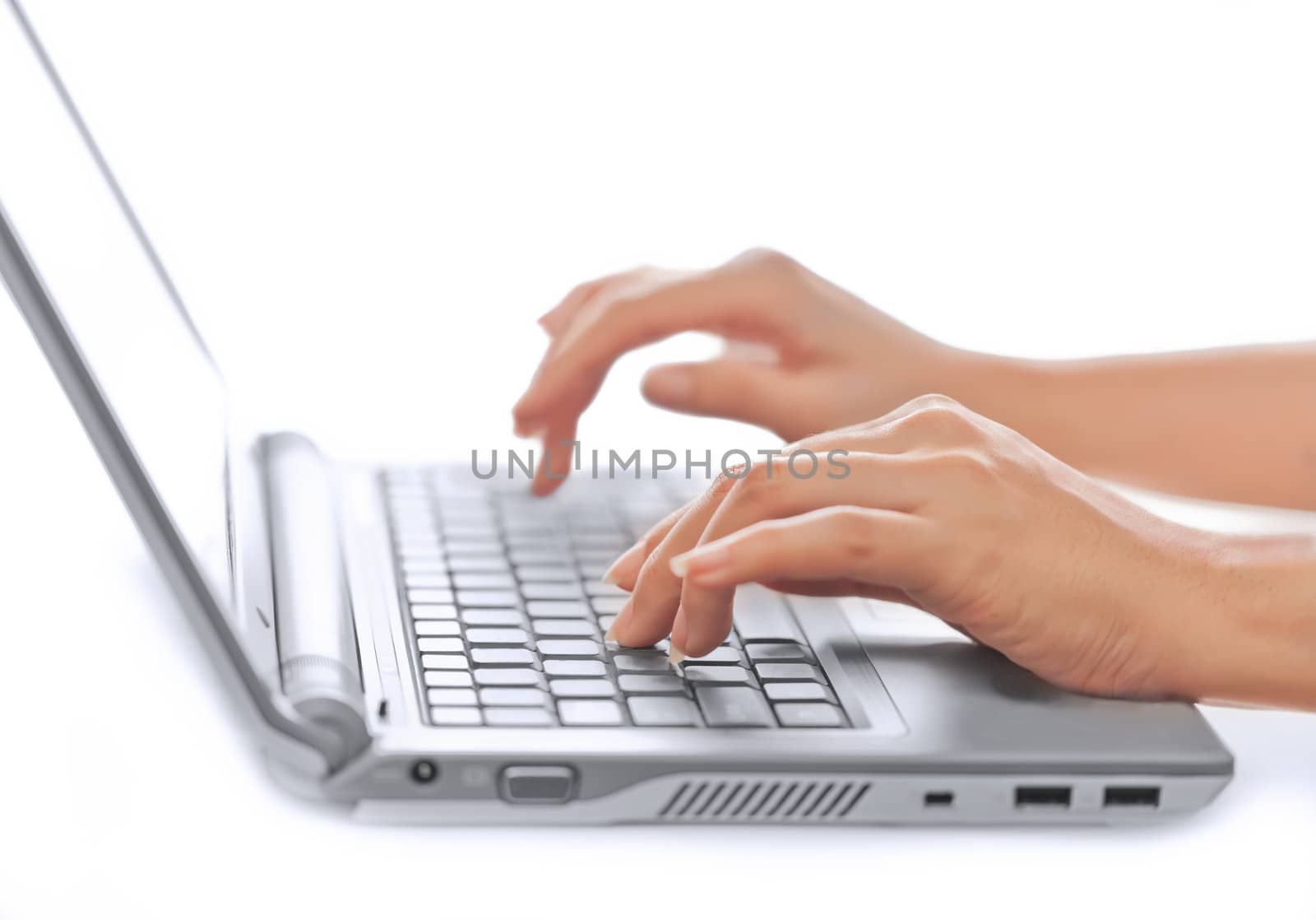 Close-up of typing female hands, selective focus