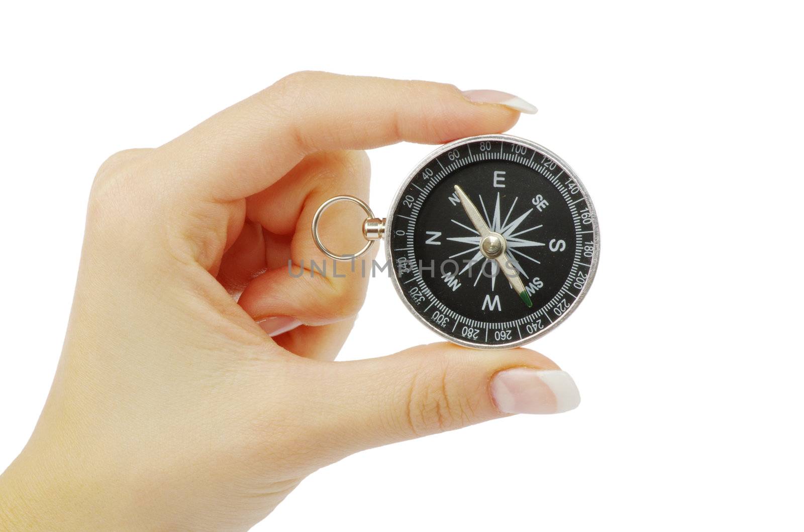 Compass in a hand isolated on the white