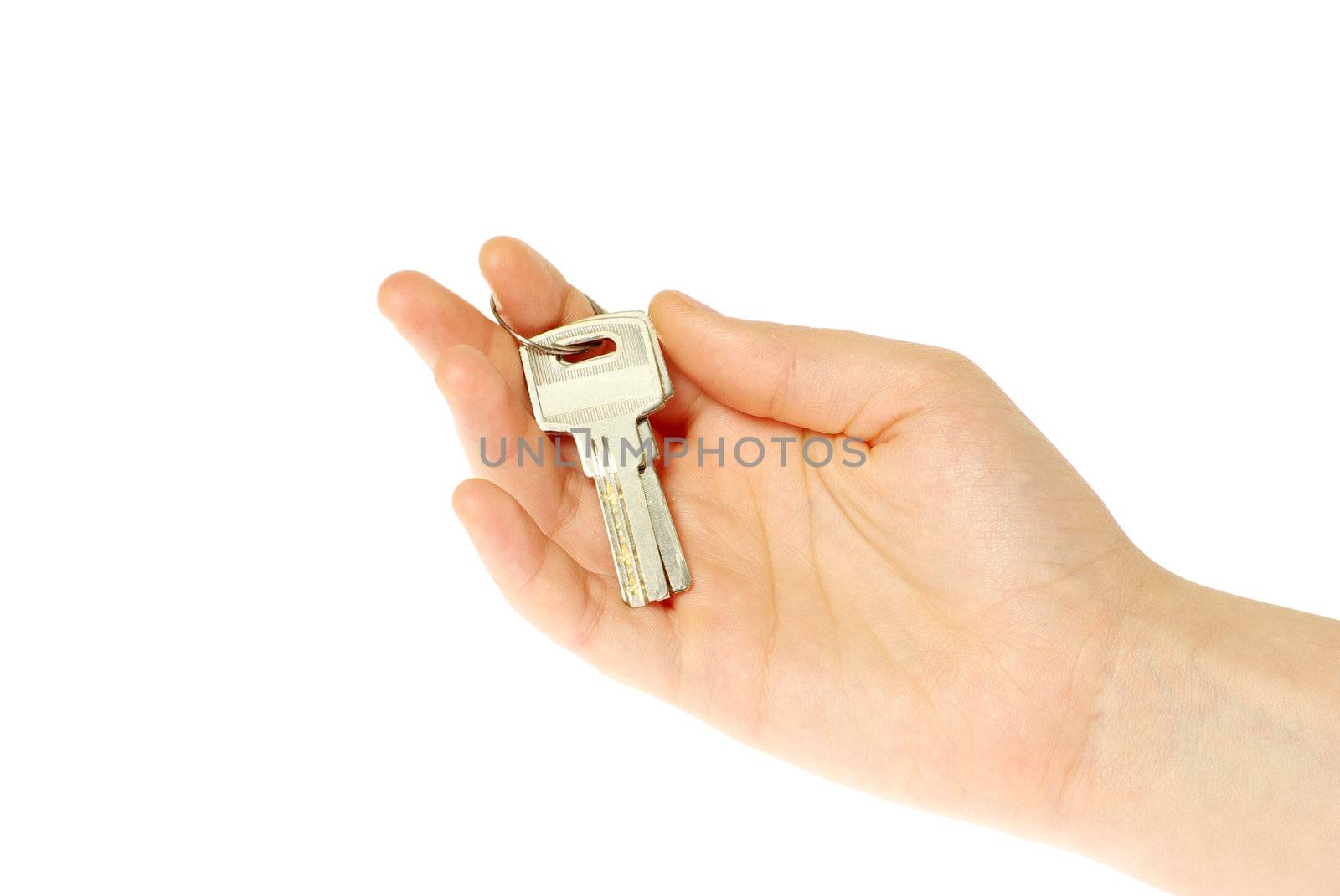 hand holds a key isolated on white