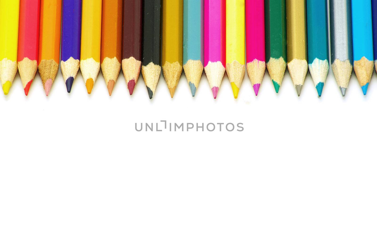  Assortment of coloured pencils  on white background