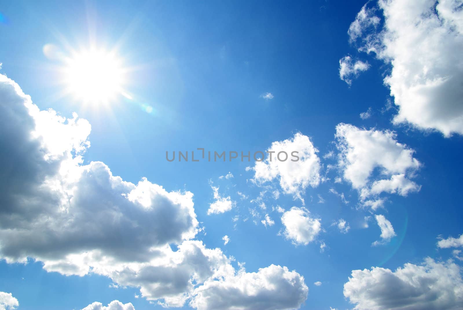 blue sky background with tiny clouds
