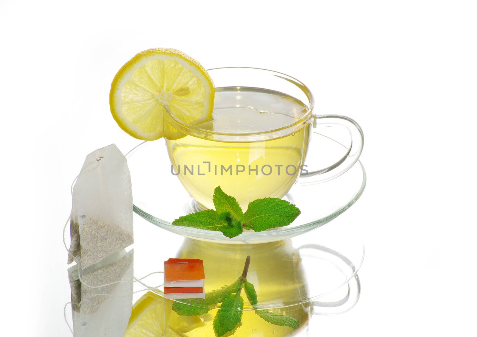 tea in cup with leaf mint  isolated on white background