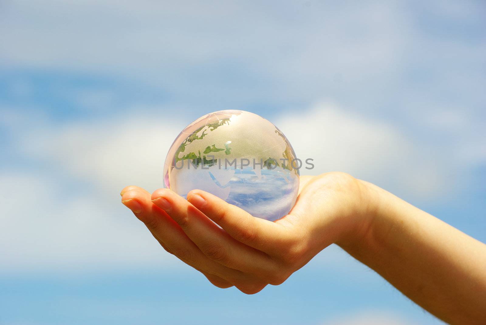 globe on the human hand