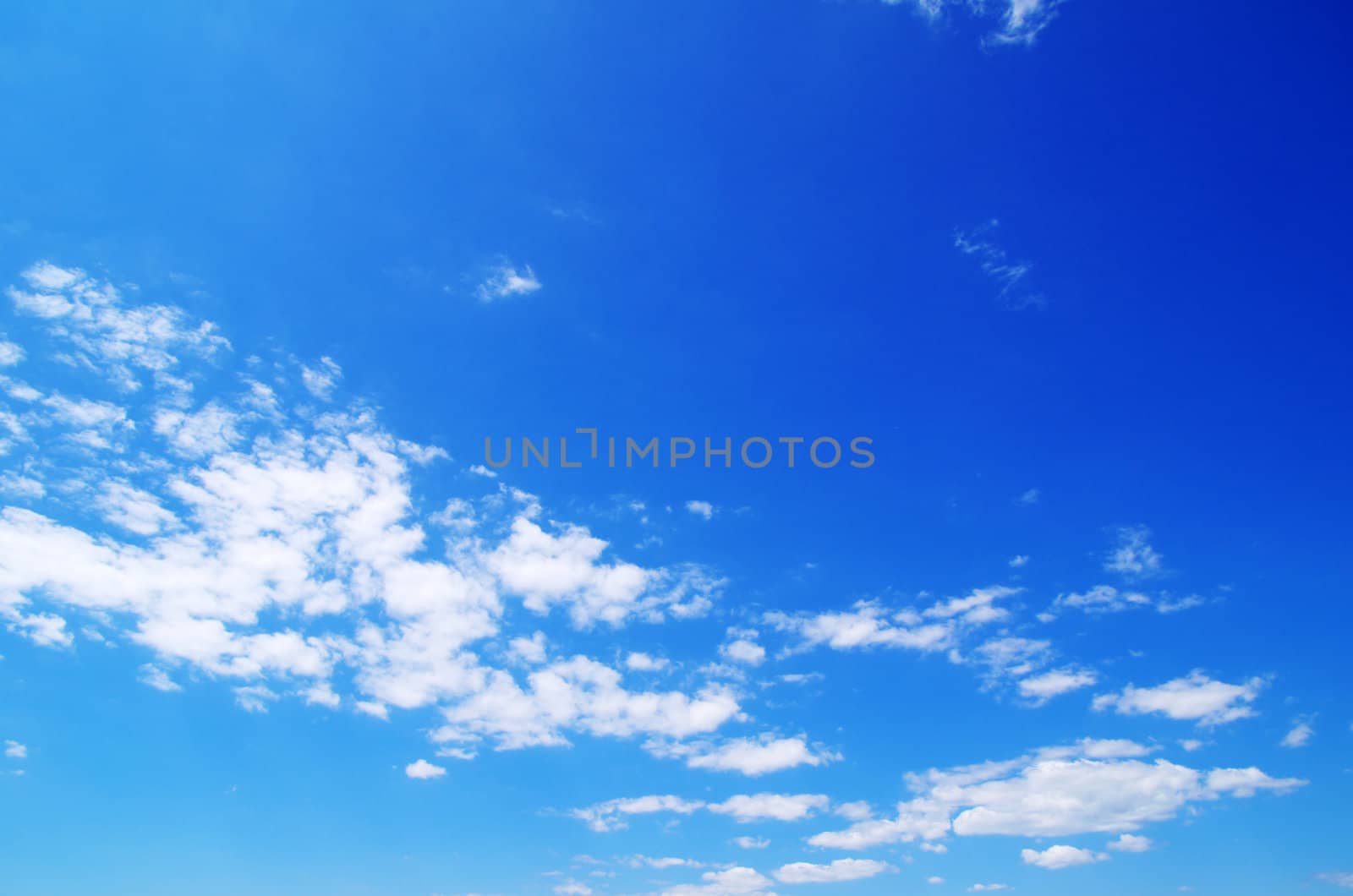 blue sky with clouds and sun