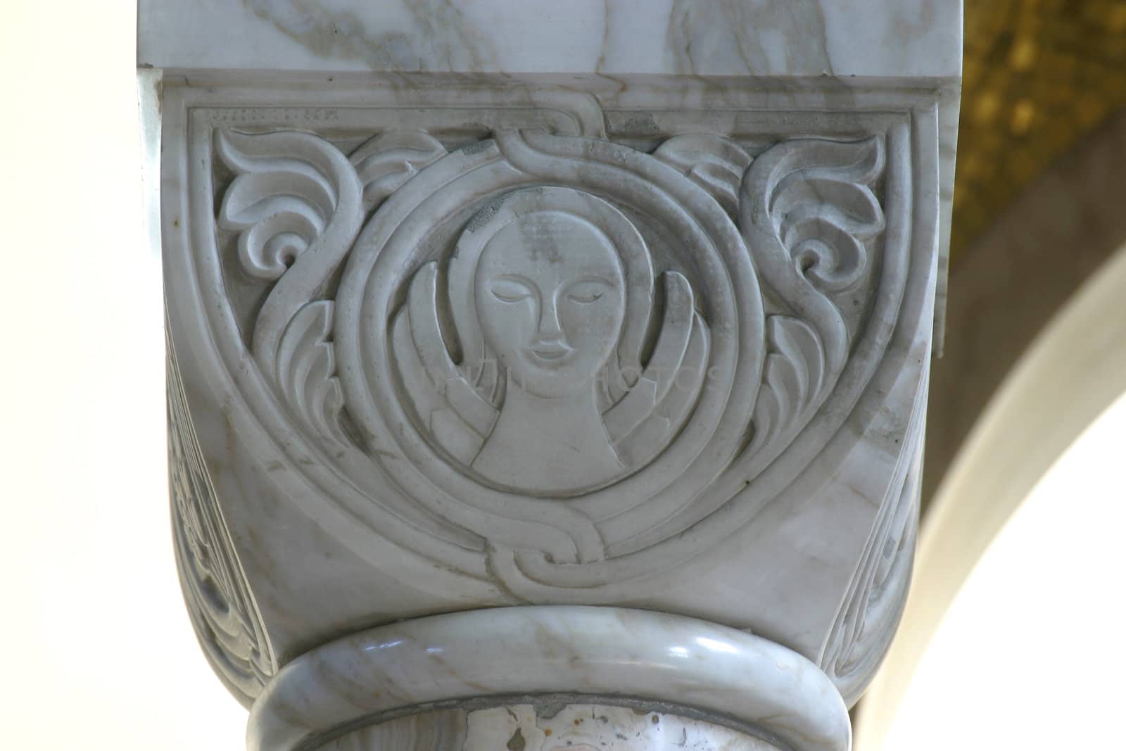 Symbol of Saint Matthew, historic church column ornate detail