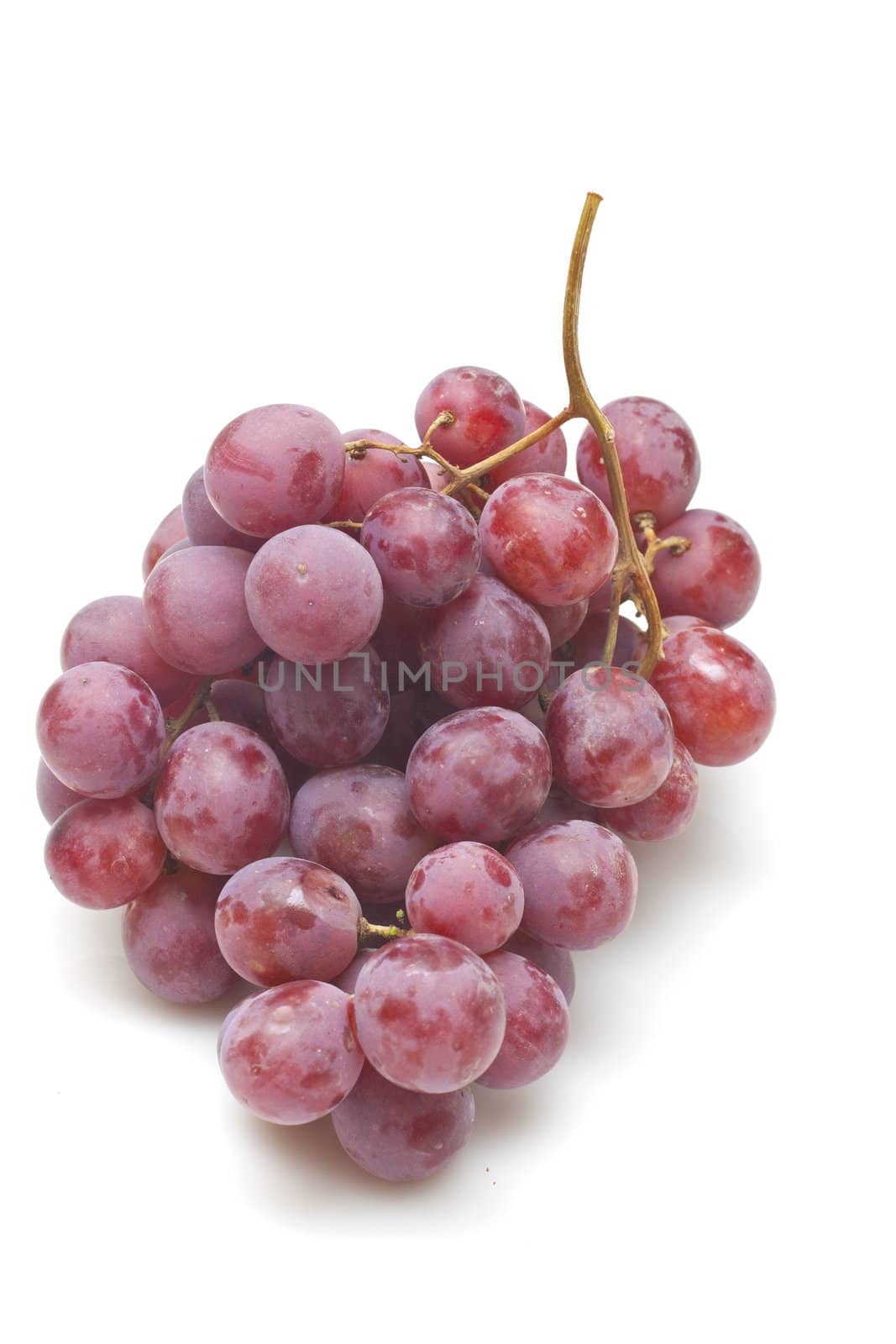 Red grapes isolated on white background